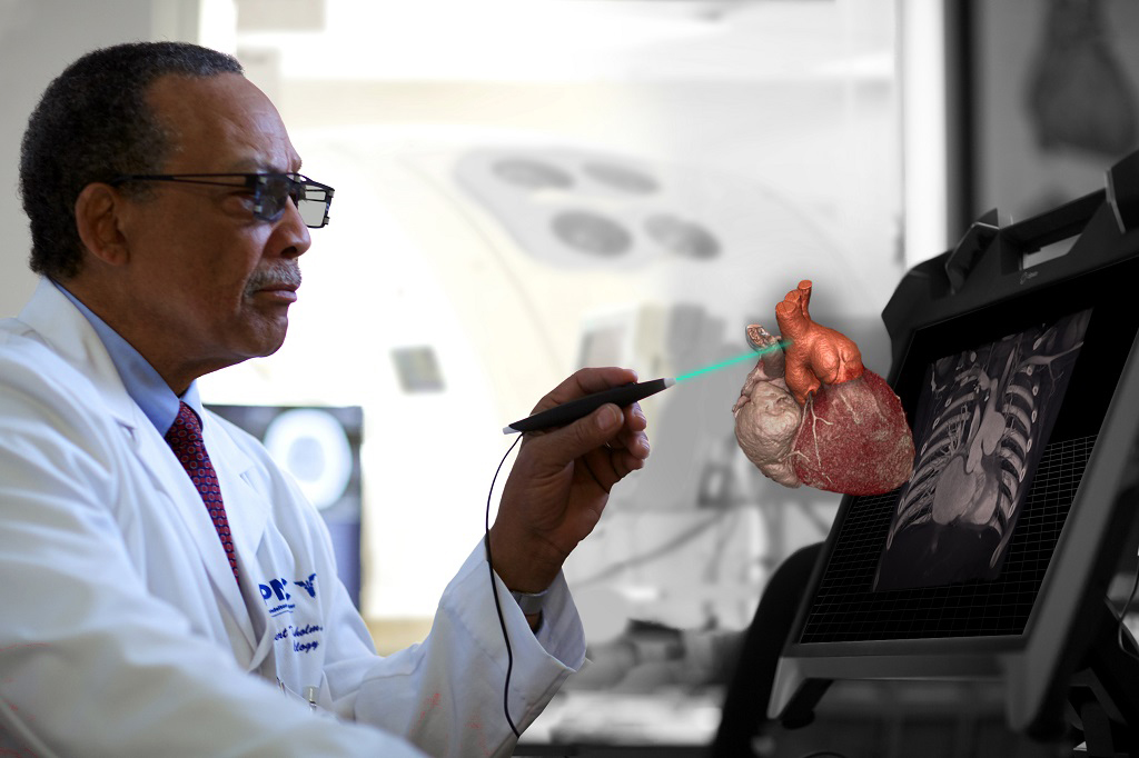 Imagen: Un nuevo conjunto de herramientas de software está diseñado para ayudarles a los médicos a visualizar e interactuar con modelos 3D de la anatomía específica de los pacientes e imprimirlos en 3D (Fotografía cortesía de EchoPixel). Imagen: Un nuevo conjunto de herramientas de software está diseñado para ayudarles a los médicos a visualizar e interactuar con modelos 3D de la anatomía específica de los pacientes e imprimirlos en 3D (Fotografía cortesía de EchoPixel).