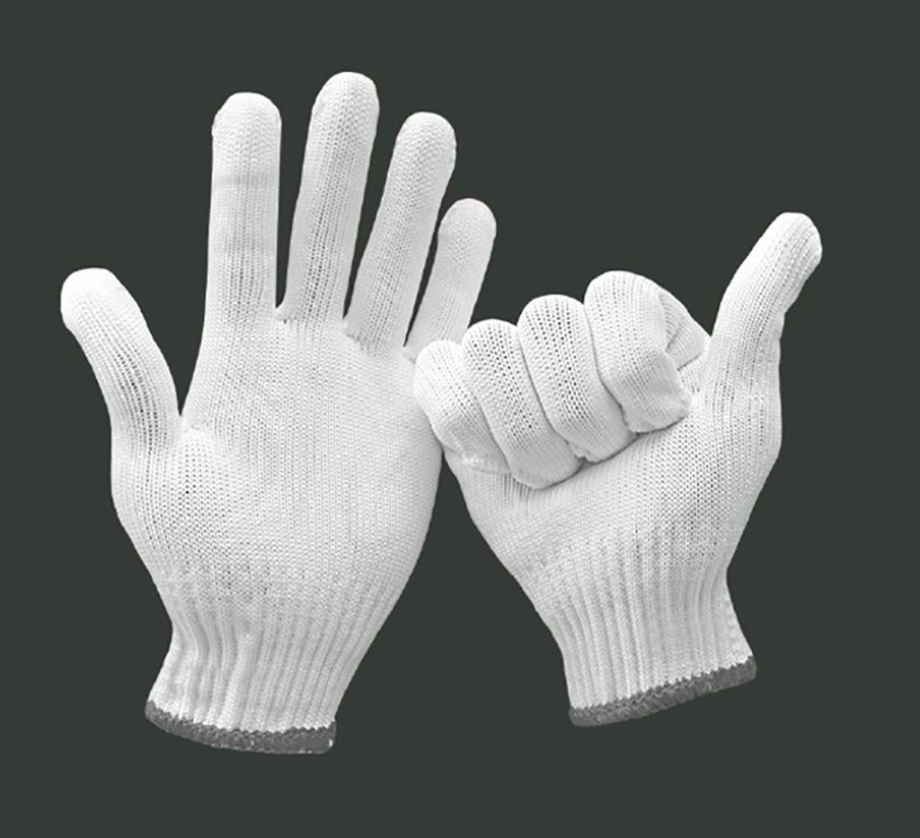Imagen: Los guantes BlocAid bien han sido incrustados con zinc para matar patógenos (Fotografía cortesía de GHS Holdings)
