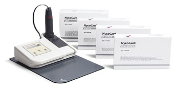 Imagen: El lector NyoCard II y los kits de análisis (Fotografía cortesía de Alere Technologies).