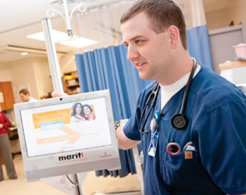 Image: Chad Solomon, RN, describes the martti system (Photo courtesy of LAN).