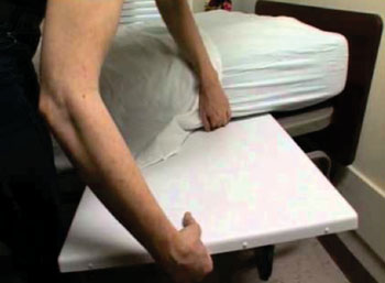 Image: The Virtual Medical Assistant placed under a mattress (Photo courtesy of Sensiotec).