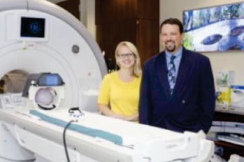 Image: Rachel Jacobs, UIC research assistant professor in psychiatry, and Scott Langenecker, UIC associate professor of psychiatry and psychology, use functional magnetic resonance imaging to examine the brain connectivity of young adults (Photo courtesy of Joshua Clark/UIC Photo Services).