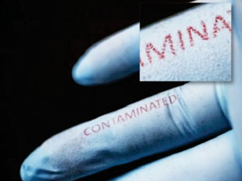 Image: Surgical gloves printed with doped bacteria-sensing agents (Photo courtesy of Tufts University).