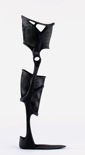 Image: 3D-printed on the Objet1000 Multi-material 3D Production System, the KAFO Splint is a customized, airy, and fashionable design for a medically functional leg brace, printed with “VeroBlack” rigid opaque PolyJet 3D printing material that provides the required weight-bearing support (Photo courtesy of Or Steiner and Stratasys).