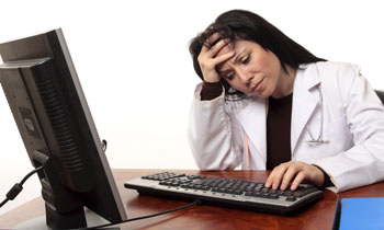 Image: Fulfilling EHR requirements takes its toll (Photo courtesy of 123rf.com).