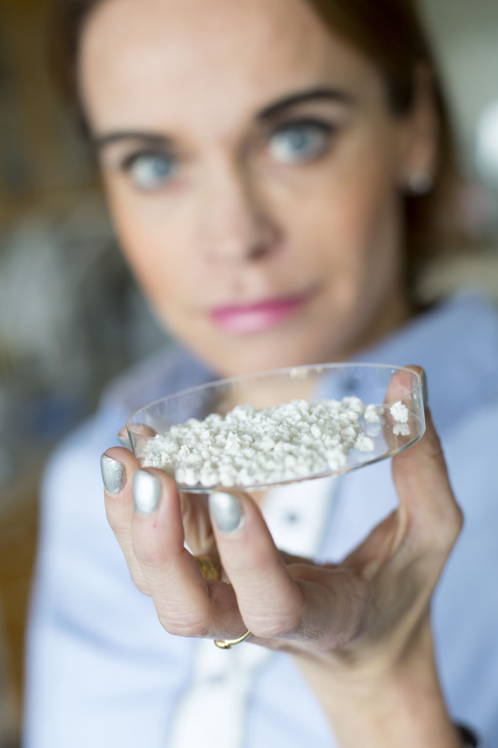 Image: Professor Maria Strømme with a sample of Upsalite (Photo courtesy of Disruptive Materials).