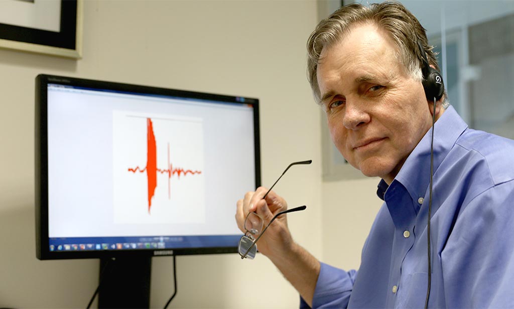 Image: Professor Barry Marshall listening to a gut recording (Photo courtesy of Scitech.org.au).