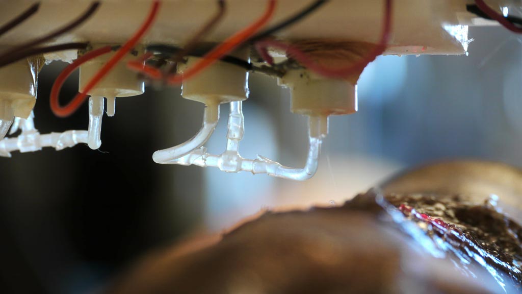 Image: A close up of the nozzle of the skin bioprinter (Photo courtesy of WFIRM).
