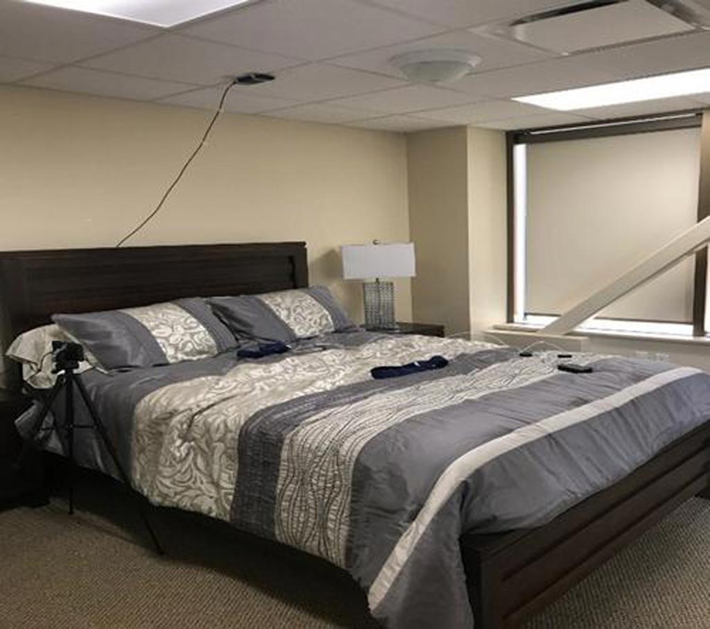 Image: The model long-term care apartment used in the study and the ceiling mounted FMCW radar (Photo courtesy UW).