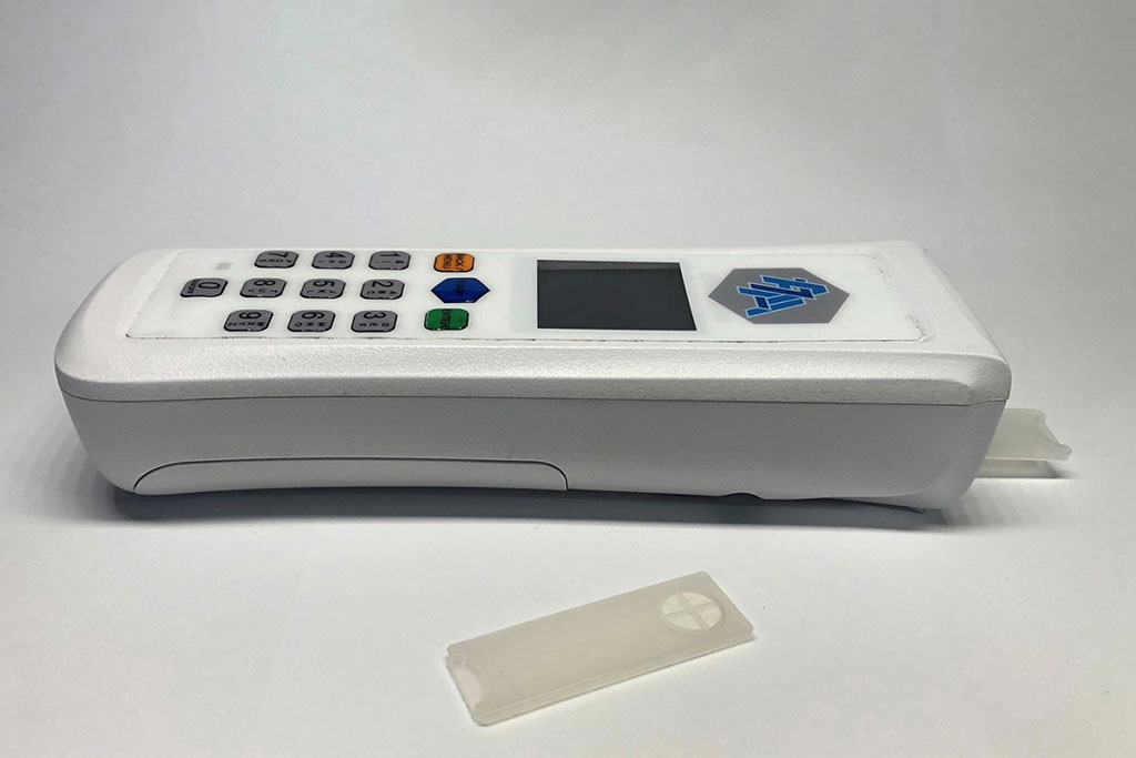 Image: A prototype of the handheld ammonia blood detector and associated test strips (Photo courtesy of Thomas Veltman).