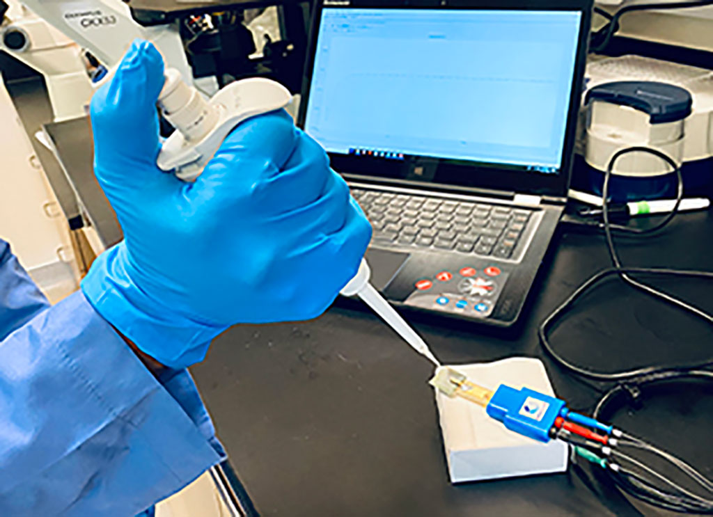 Image: Testing a nanotube-based electrochemical biosensor (Photo courtesy of University of Nevada)