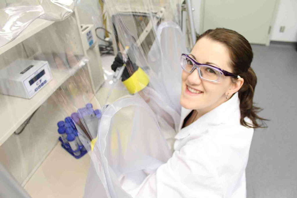 Image: Team member Nicole Sylvain, with USask`s College of Medicine, in a lab at the CLS (Photo courtesy of CLS)
