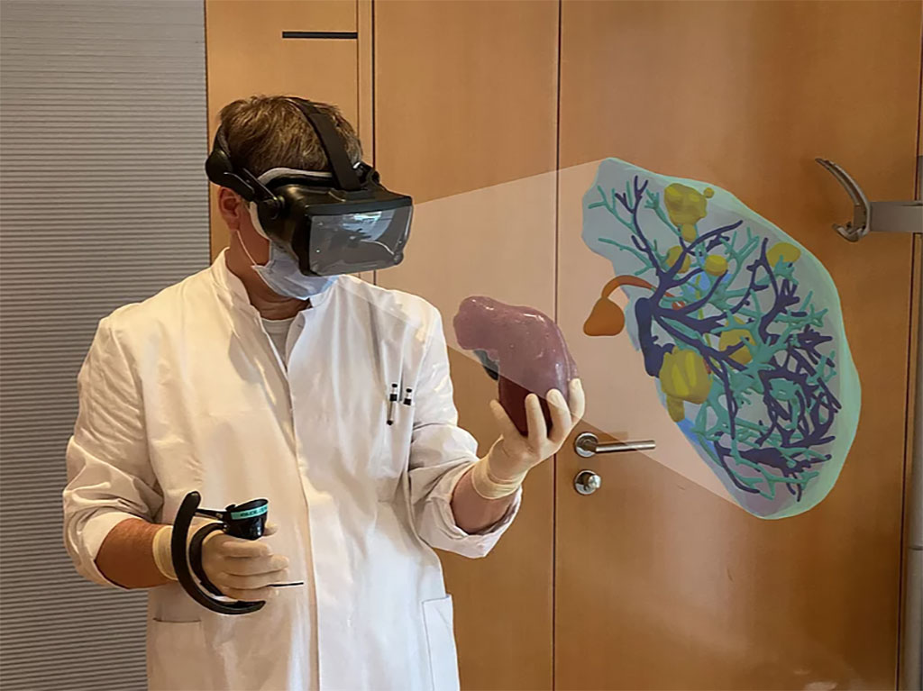 Image: A surgeon plans a procedure using a 3D-printed liver and VR glasses (Photo courtesy of University of Bremen)