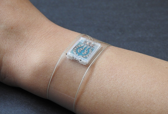 Image: A microneedle array worn on top of the wrist measures glucose, alcohol and lactate levels in the interstitial fluid under the skin (Photo courtesy of An-Yi Chang/UC San Diego)