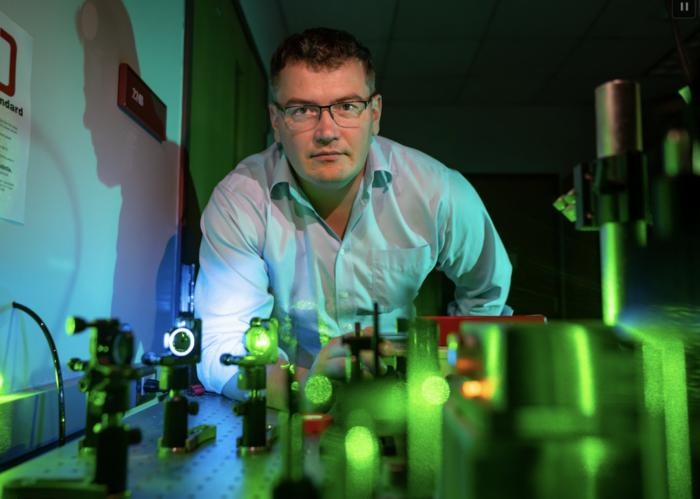 Image: The innovative technique by Dmitry Kurouski, Ph.D., employs a light-based device to analyze skin composition for health indicators (Hannah Harrison/Texas A&M AgriLife)