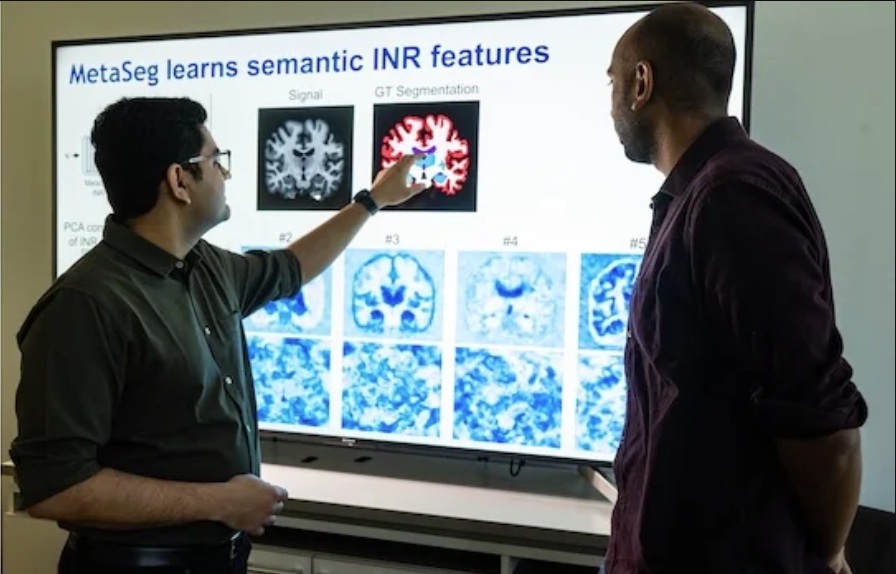 Image: The new approach by researchers Guha Balakrishnan and Kushal Vyas sets a standard for brain and other medical imaging (Photo courtesy of Jeff Fitlow/Rice University)
