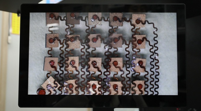 mage: A magnified view of the 5×4 ultrasonic transducer array (Photo courtesy of KIMM)