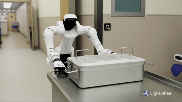 Image: A humanoid robot performs a perioperative logistics task, representing the next phase of Physical AI in healthcare operations. (photo courtesy of Lightwheel)