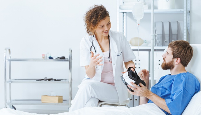 Image: A virtual reality nature scene paired with classical music significantly lowered patients’ blood pressure within 15 minutes in the emergency department. (Image Credit: iStock)