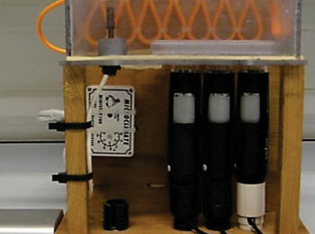 Image: The low cost microscope system constructed to perform multiple simultaneous time-lapse studies on various cell types (Photo courtesy of Adam Lynch).