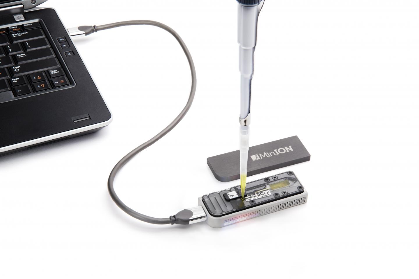 Image: MinION USB-attachable miniature DNA sequencing device (Photo courtesy of Oxford Nanopore).