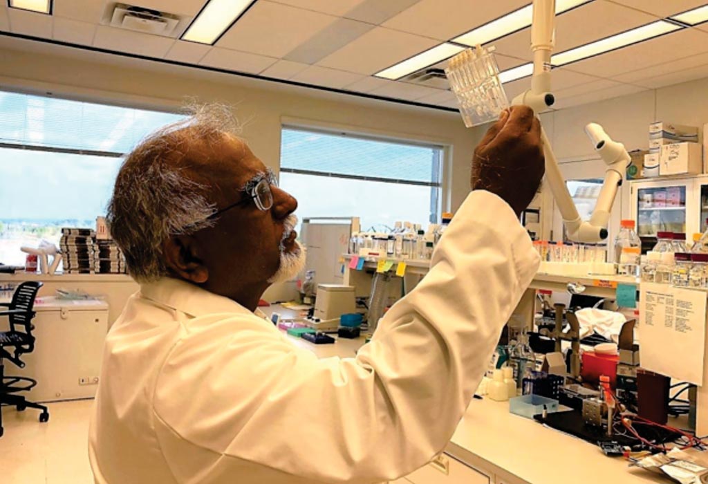 Image: Dr. Krishnan Chittur, PhD, chief technology officer and co-founder of GeneCapture, holds the prototype of the rapid infection test cartridge (Photo courtesy of GeneCapture).