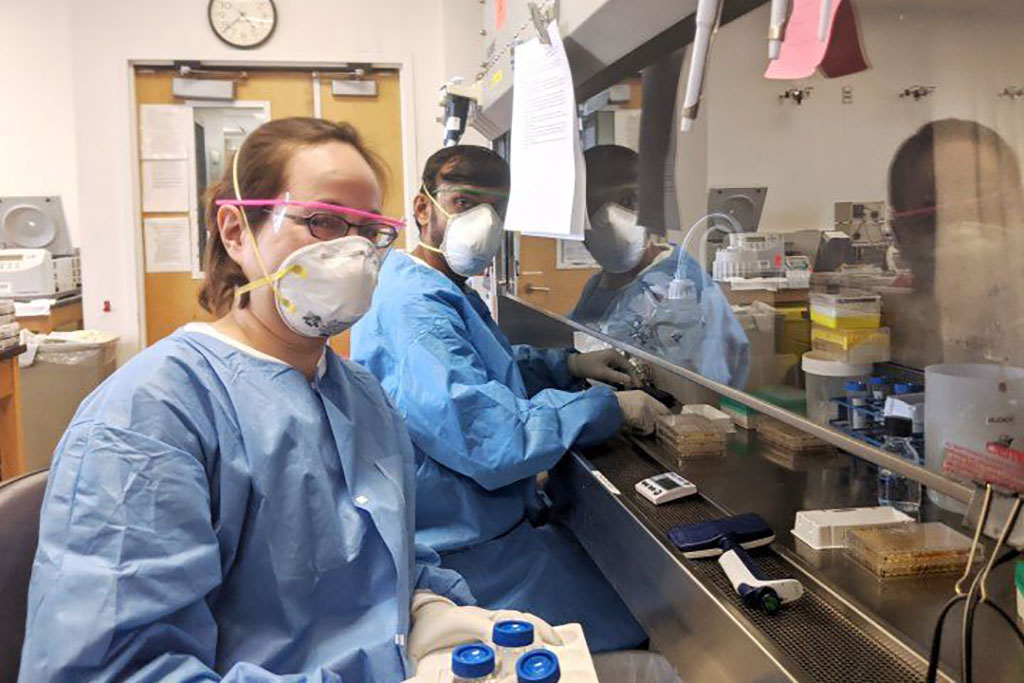 Image: Tori Yamamoto, left, and Ujjwal Rathore, work to test COVID-19 antibody tests (Photo courtesy of Joe Hiatt)