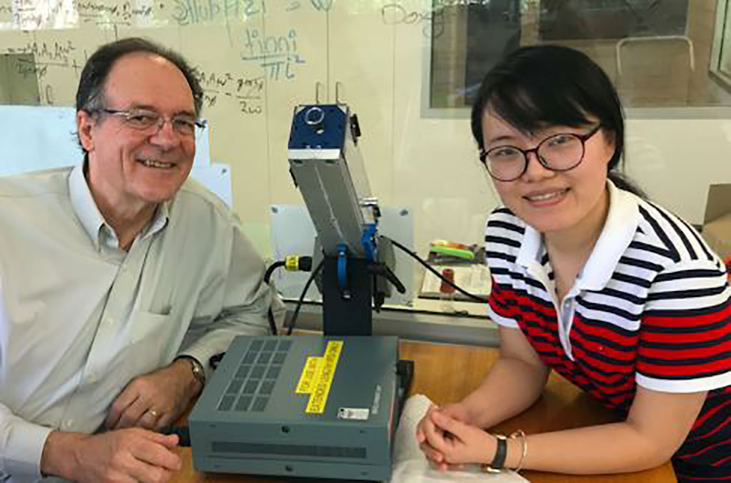 Image: Professor Colin Raston and Dr Xuan Luo with a VFD (Photo courtesy of Flinders University)