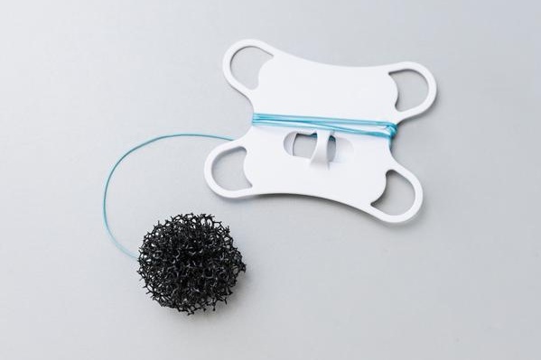Image: Capsule sponge opened to reveal the sponge (Photo courtesy of StillVision)