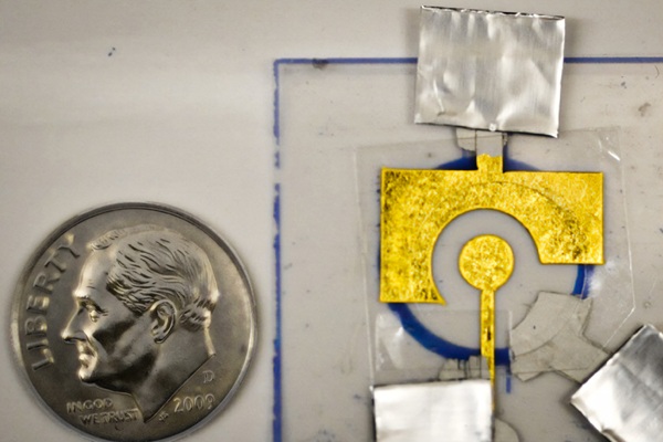Image: The electrochemical sensors consist of DNA adhered to an inexpensive gold leaf electrode (Photo courtesy of MIT)
