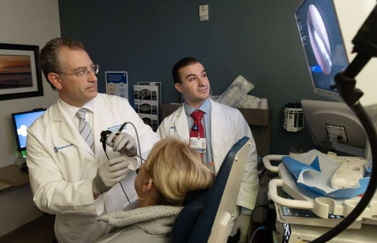 Image: Duke Health researchers Bradley J. Goldstein, M.D., Ph.D. and Vincent M. D\'Anniballe have shown a simple nasal swab can be used to detect early Alzheimer’s signals ( phot courtesy of Duke Health/ Shawn Rocco)