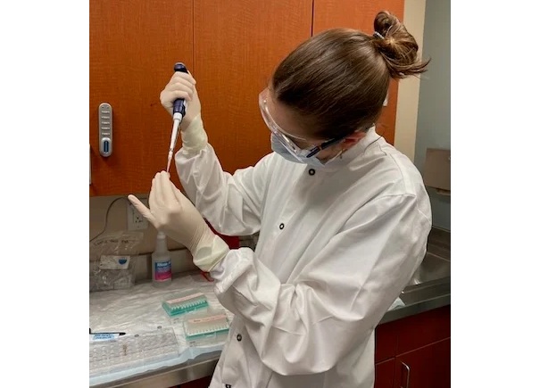 Image: Study first author Emilie Newsham Novak working with the samples at The University of Texas MD Anderson Cancer Center (Photo courtesy of Rice University)