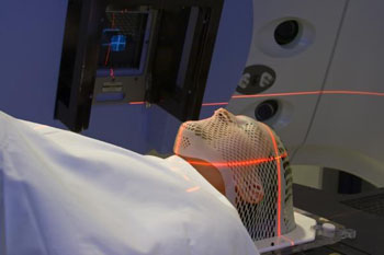 Image: Breast cancer patients that can hold their breath over five minutes allow targeted radiotherapy to be administered with just one dose in each daily session (Photo courtesy of the University of Birmingham).