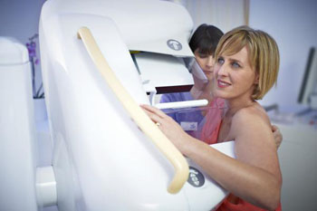 Image: A woman undergoing a mammogram (Photo courtesy of the FDA).