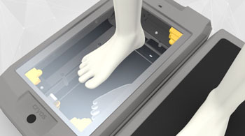 Image: A foot being scanned in the CryoScan3D (Photo courtesy of Cryos Technologies).