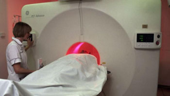 Image: A patient undergoing a positron emission tomography (PET) scan (Photo courtesy of Wellcome Images).