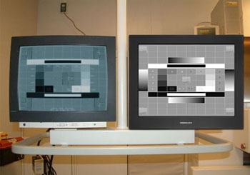 Image: A Siemens vascular room with older CRT and the new Modalixx LCD side by side (Photo courtesy of Ampronix).