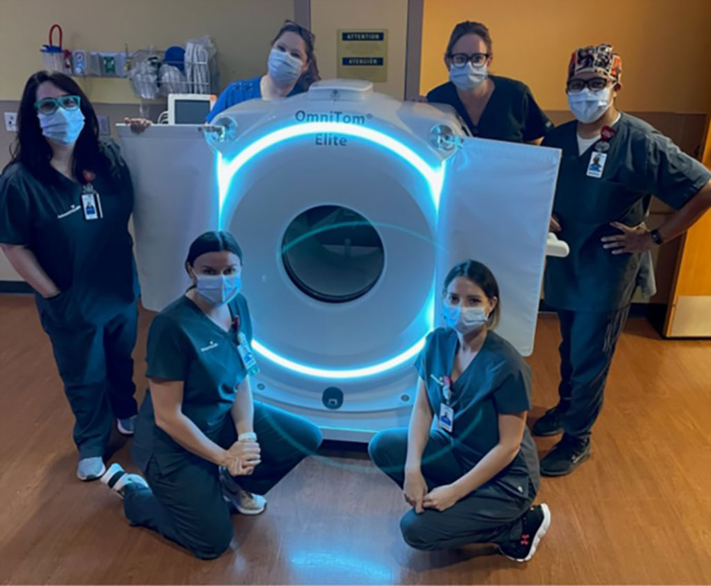 Image: The CT team at Advent Health Orlando with the OmniTom Elite (Photo courtesy of NeuroLogica)