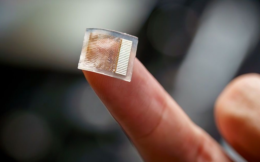 Image: This small, stretchy skin patch uses ultrasound to continuously monitor blood pressure deep inside the body (Photo courtesy of David Baillot/UC San Diego Jacobs School of Engineering)