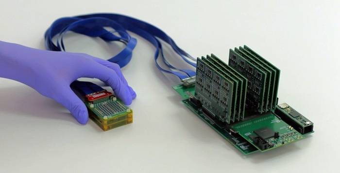 Image: The new system could be used to scan people who are at high risk for breast cancer (Photo courtesy of Conformable Decoders Lab at the MIT Media Lab)