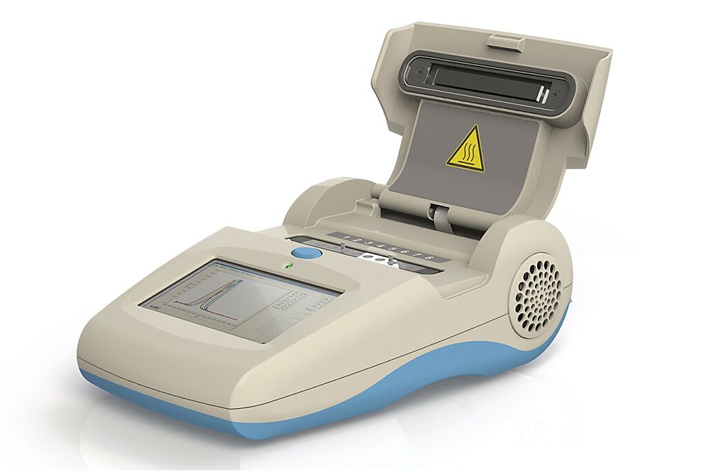 Imagen: El escáner de mano, Genie III, tiene un sistema de excitación y detección de fluorescencia de dos colores (Fotografía cortesía de OPTIGENE Ltd).