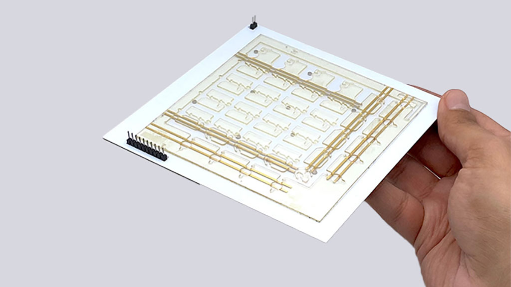 Imagen: El kit de laboratorio de diagnóstico portátil es capaz de realizar pruebas multiplexadas y agrupadas totalmente automatizadas (Fotografía cortesía de UCLA) Imagen: El kit de laboratorio de diagnóstico portátil es capaz de realizar pruebas multiplexadas y agrupadas totalmente automatizadas (Fotografía cortesía de UCLA)