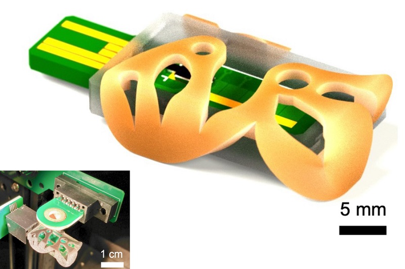 Imagen: El ionizador miniatura impreso en 3D es un componente clave de un espectrómetro de masas (foto cortesía del MIT)