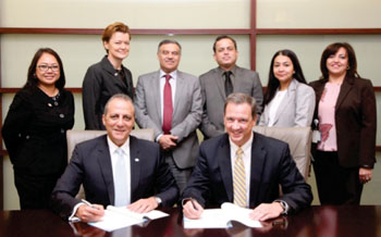 Image: Hisham Radwan and David Farrick sign the new agreement (Photo  courtesy of the American Hospital Dubai).