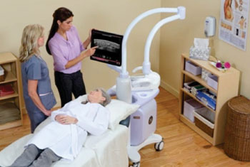 Image: The Invenia automated breast ultrasound system (ABUS) provides a more enhanced patient experience and effective diagnosis than mammography alone in women with dense breasts (Photo courtesy of GE Healthcare). Image: The Invenia automated breast ultrasound system (ABUS) provides a more enhanced patient experience and effective diagnosis than mammography alone in women with dense breasts (Photo courtesy of GE Healthcare).