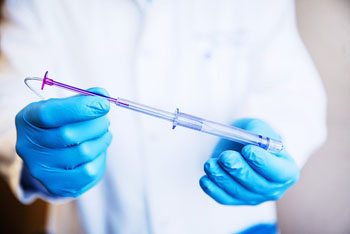 Image: The Velano device blood draw device (Photo courtesy of Velano Vascular and WSJ).