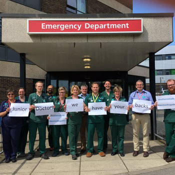 Image: Senior doctors in support of their junior colleagues (Photo courtesy of Dr. Sophie Gough).