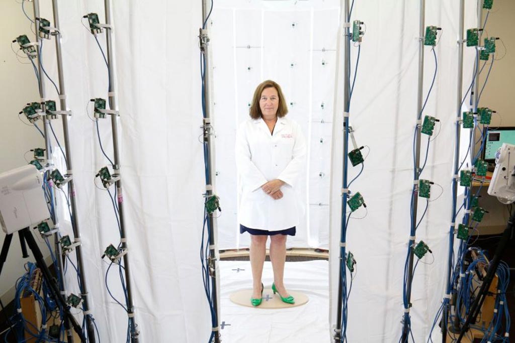 Image: Dr. Leslie Saxon standing in a virtual doctor photo tent (Photo courtesy of Eddie Sakaki/USC).