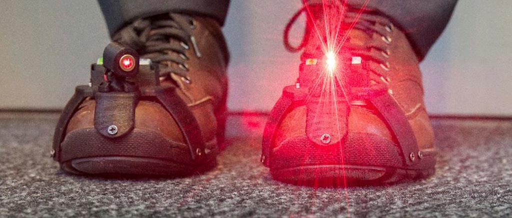 Image: Research suggests laser shoes can help PD patients walk safer (Photo courtesy University of Twente).