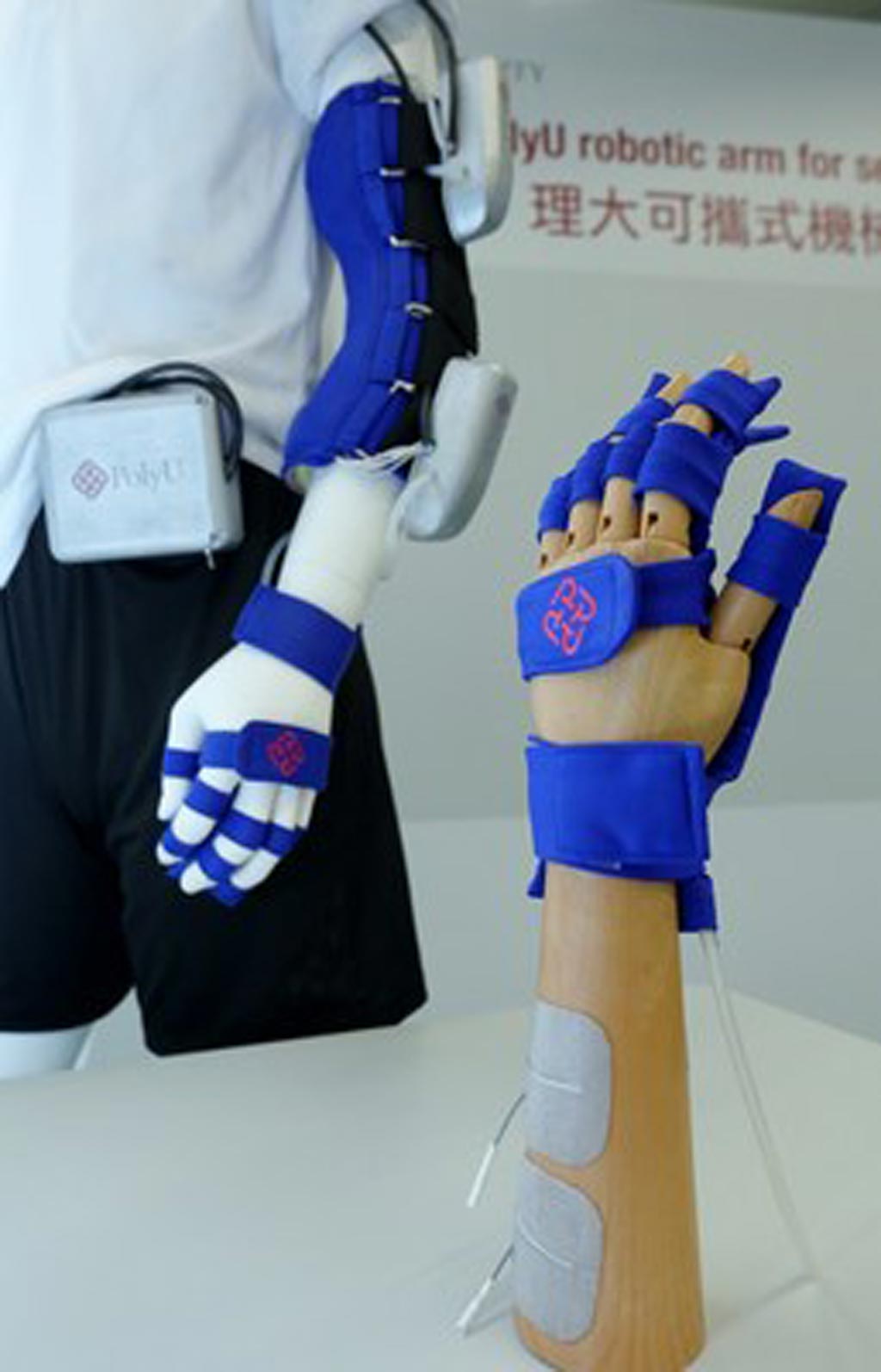 Image: A rehabilitation device combines an exo-skeleton and soft robotics (Photo courtesy of PolyU).